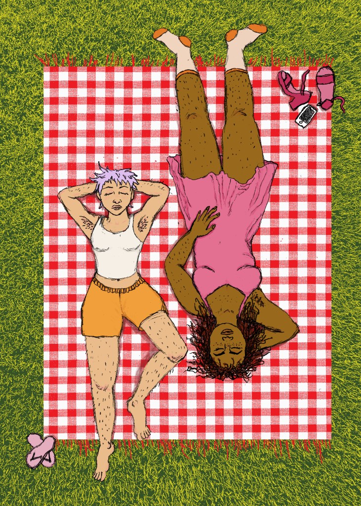 Two girls, dressed in the colours of the lesbian pride flag, lie out together across a red and white gingham picnic rug on the grass. Their shoes are off and they lie on their backs in the sun, close but not touching, just at ease with the delight of the weather and each other's company.